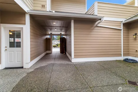a view of a porch with a door