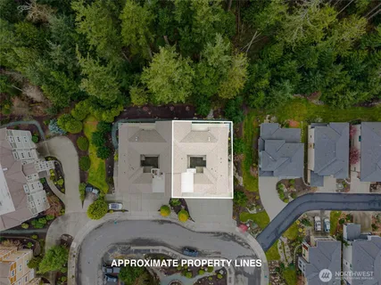 an aerial view of a house with a garden