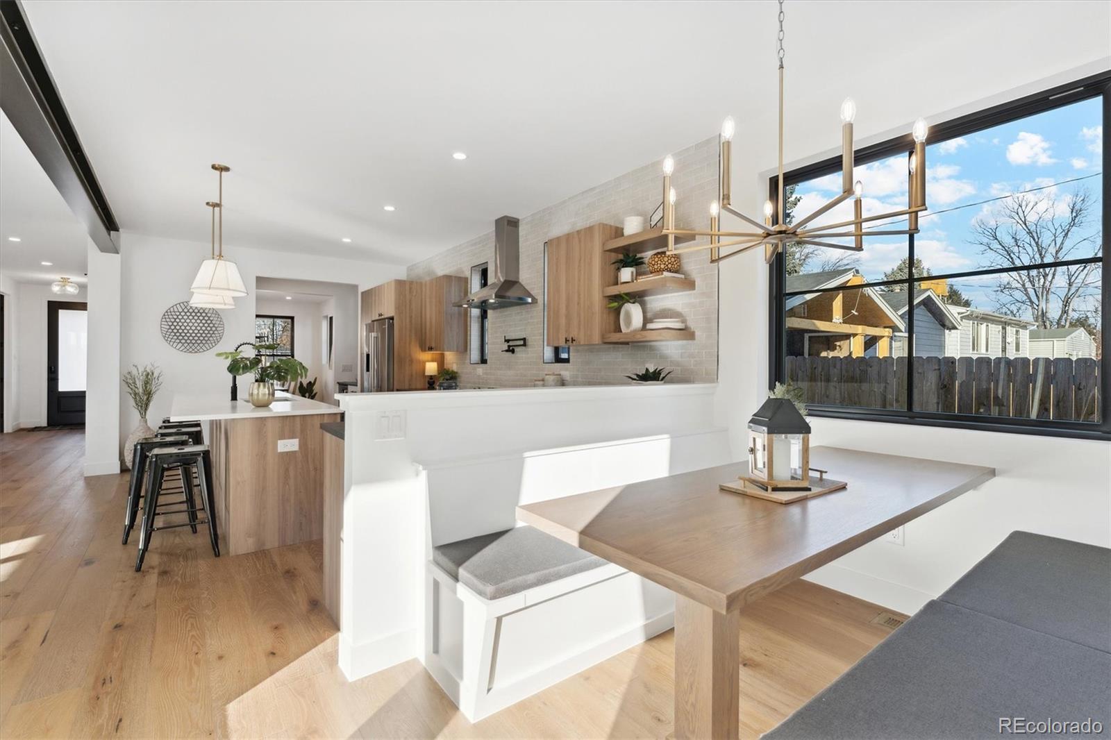 2540 Jay Street Edgewater, CO 80214 - Photo 13 of 37 a kitchen with a table and chairs