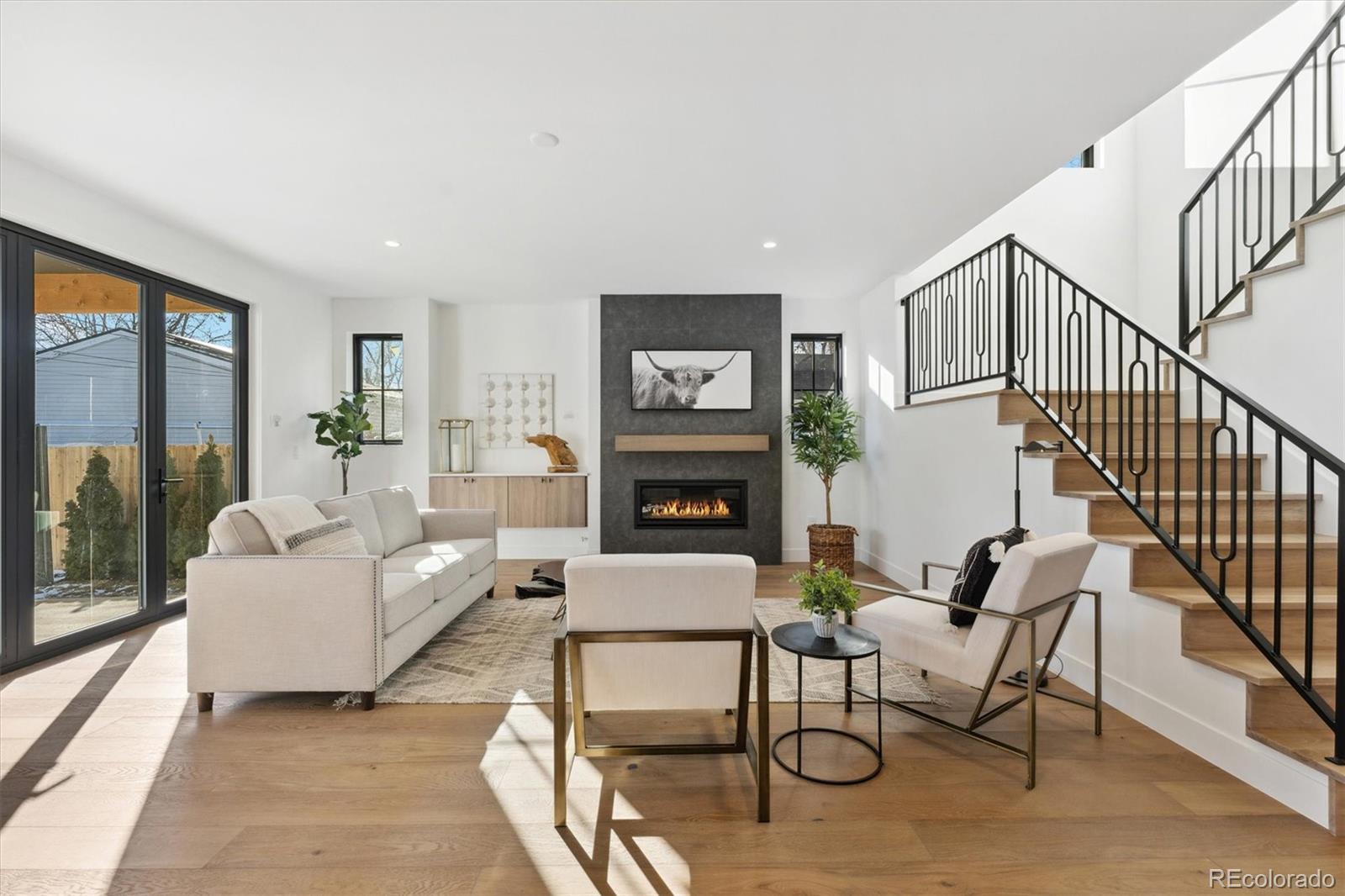 2540 Jay Street Edgewater, CO 80214 - Photo 14 of 37 a living room with furniture and a fireplace