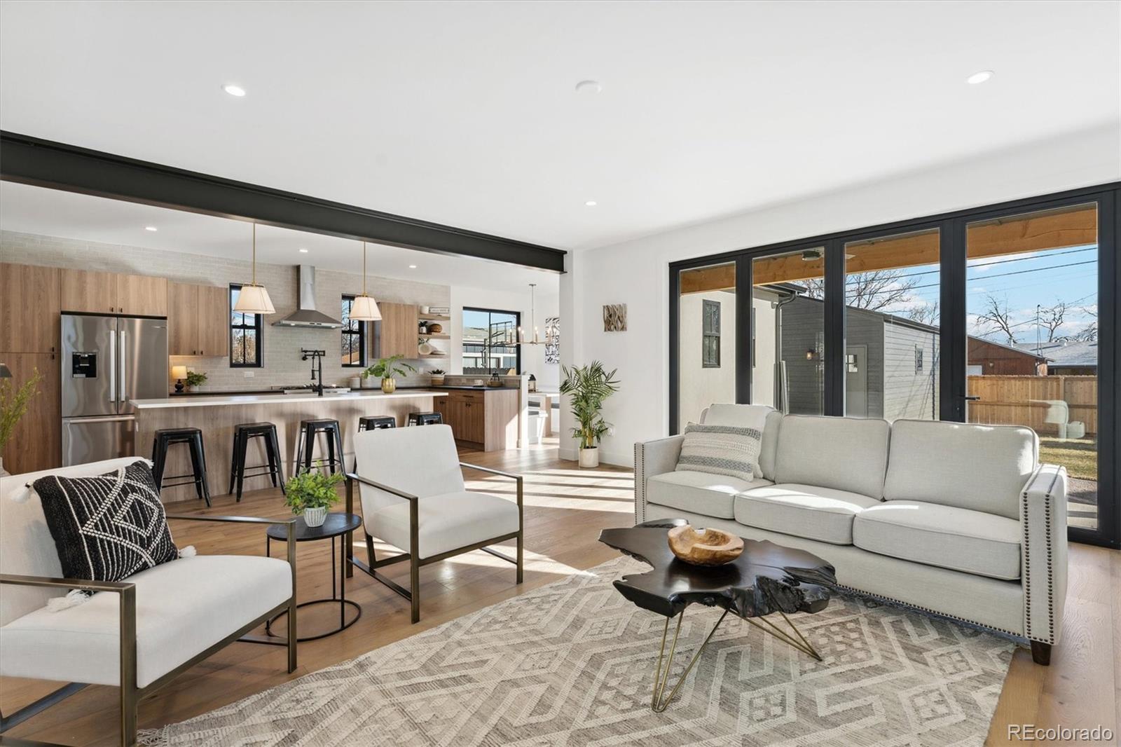 2540 Jay Street Edgewater, CO 80214 - Photo 15 of 37 a living room with furniture and a large window