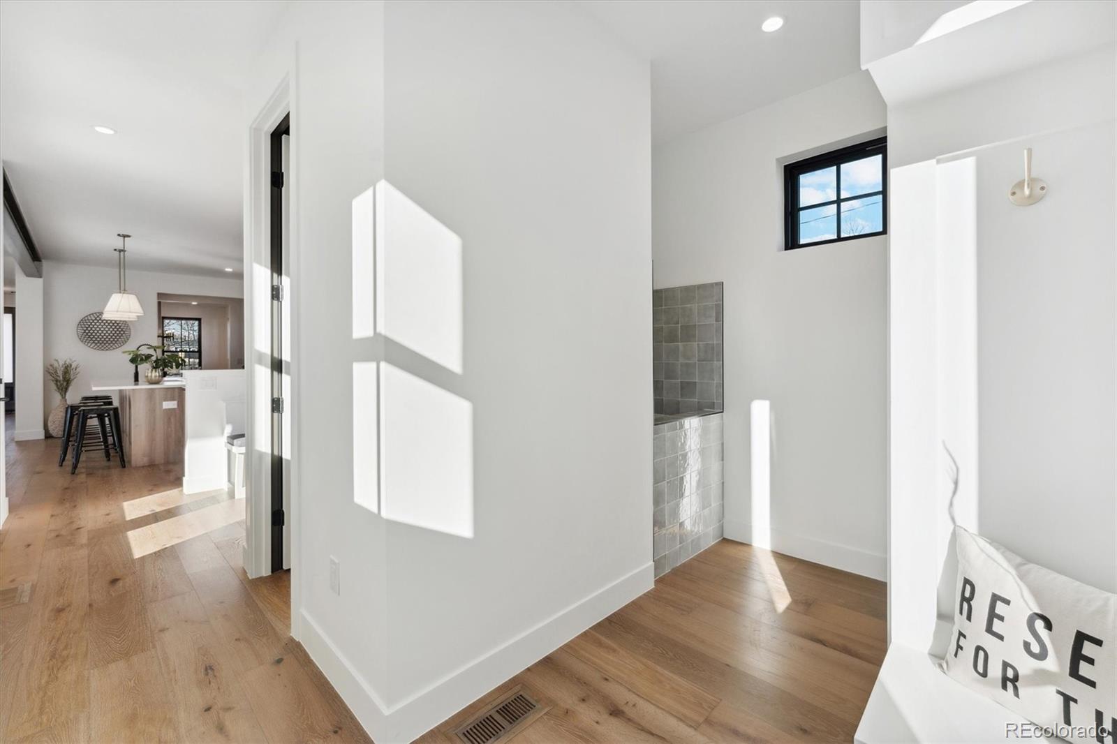 2540 Jay Street Edgewater, CO 80214 - Photo 19 of 37 wooden floor in an empty room with a window