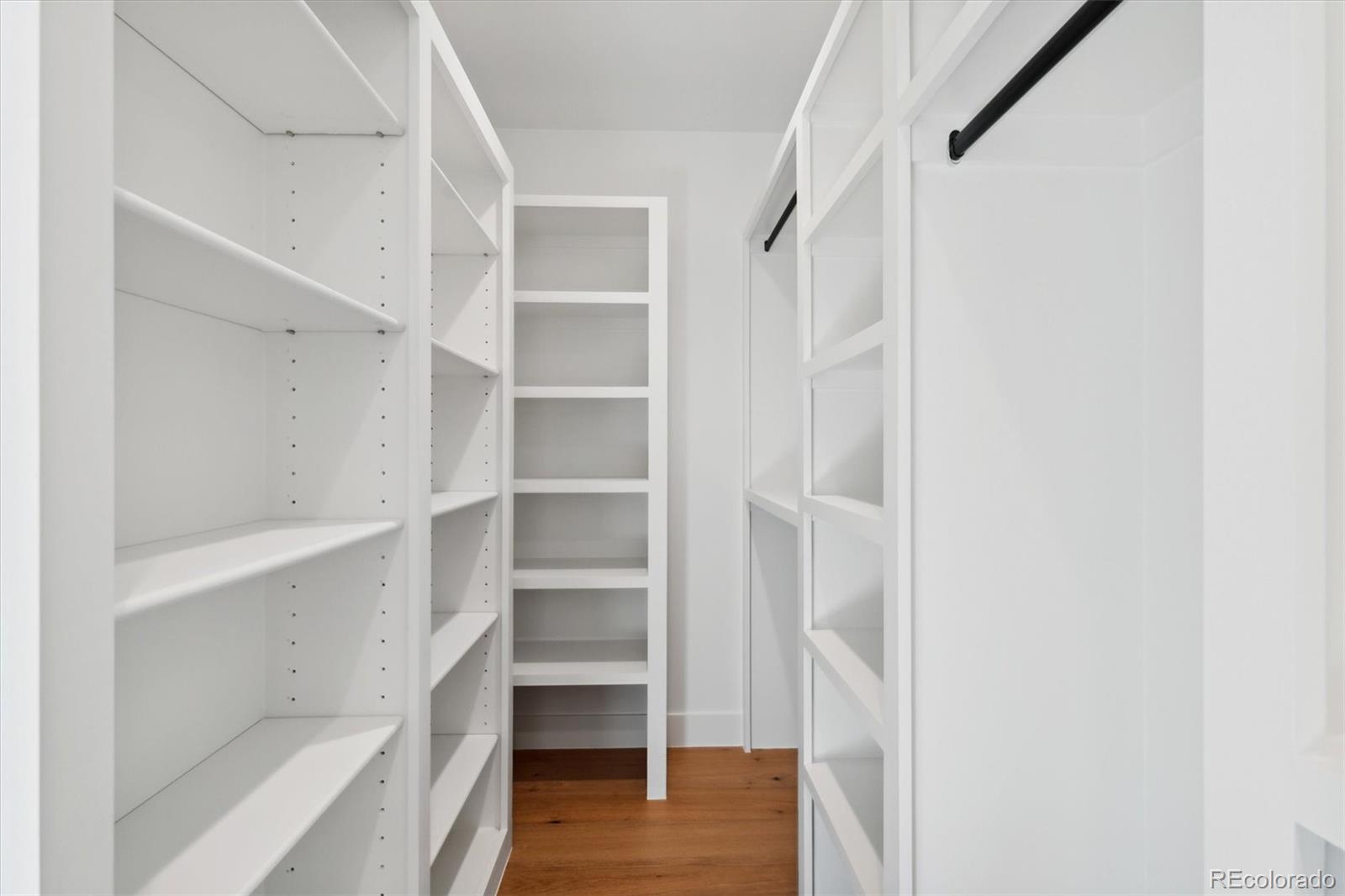 2540 Jay Street Edgewater, CO 80214 - Photo 23 of 37 a view of walk in closet with empty racks
