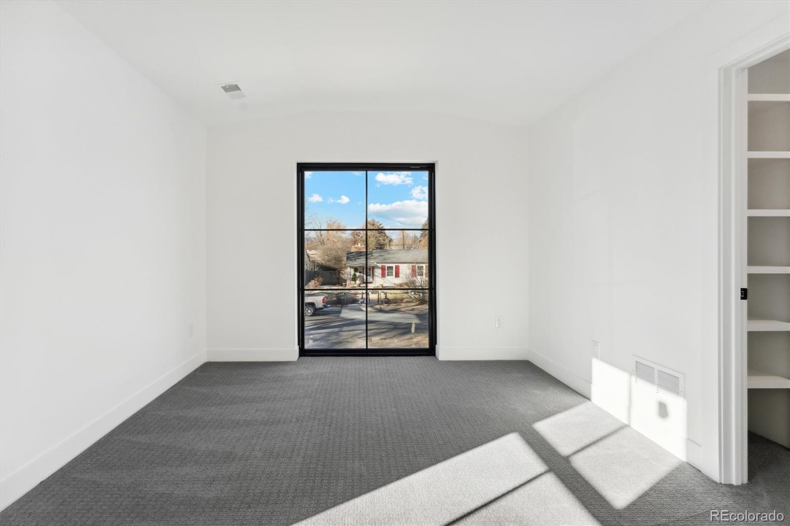 2540 Jay Street Edgewater, CO 80214 - Photo 29 of 37 an empty room with large window
