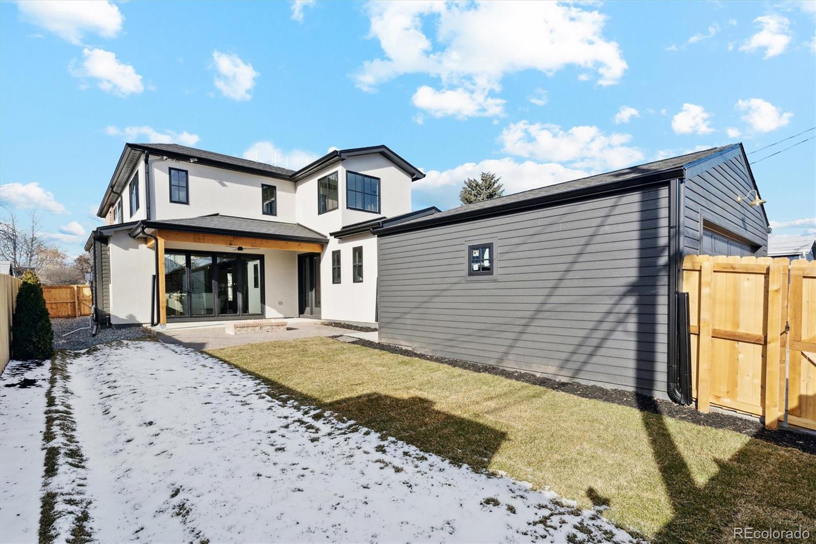 2540 Jay Street Edgewater, CO 80214 - Photo 34 of 37 a front view of a house with a yard