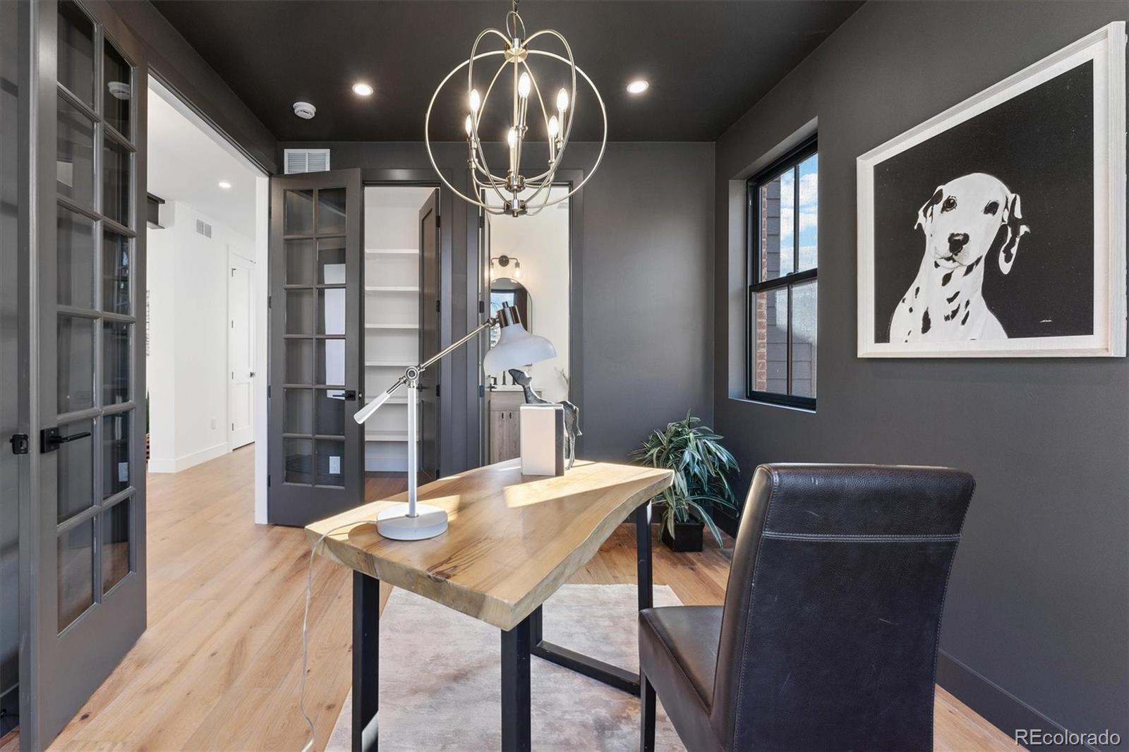 2540 Jay Street Edgewater, CO 80214 - Photo 4 of 37 a view of a dining room with furniture and wooden floor