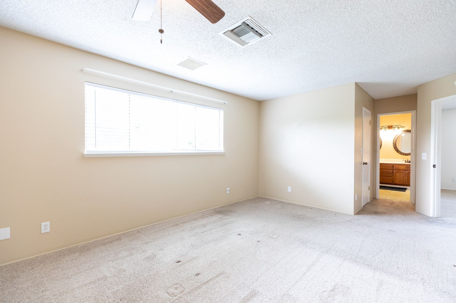 514 Suzanne Street Ridgecrest, CA 93555 - Photo 16 of 30 a view of an empty room with a window