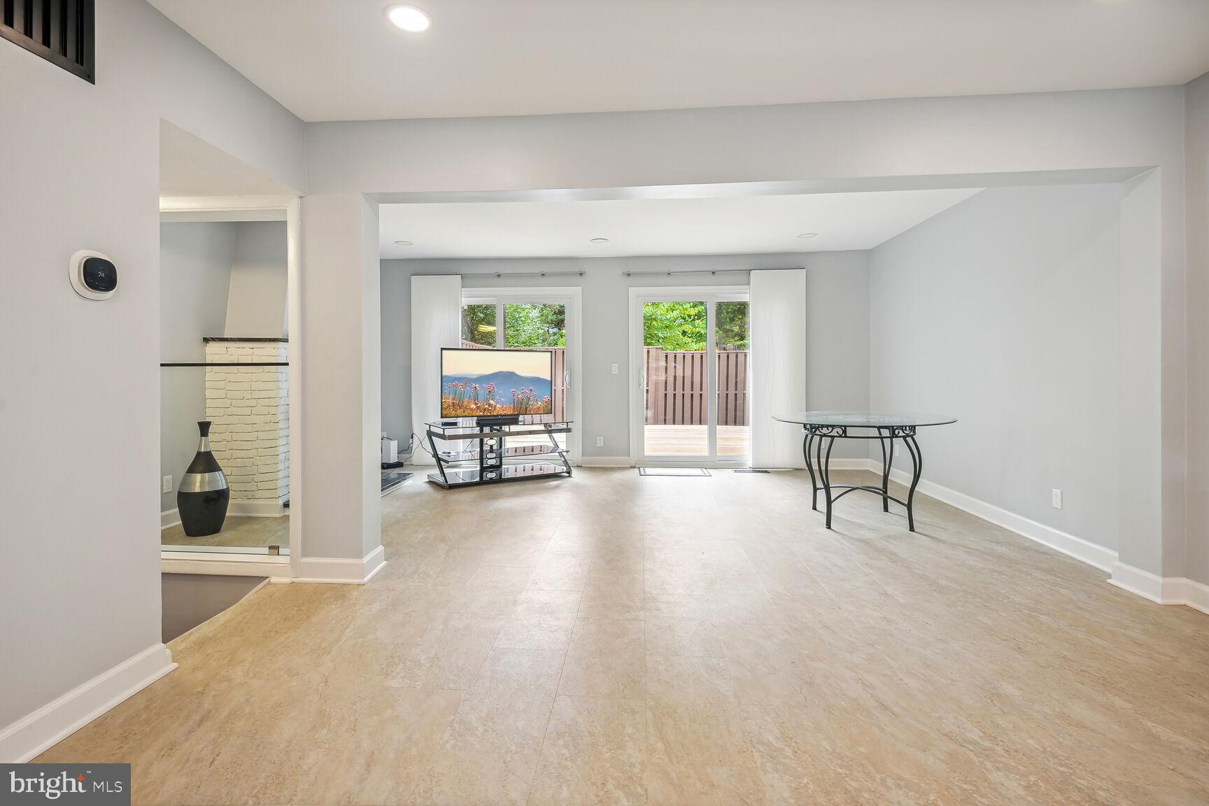 1635 Valencia Way Reston, VA 20190 - Photo 9 of 22 a view of a livingroom with furniture and a window