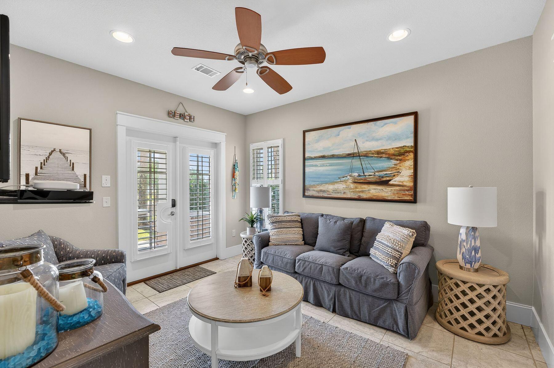 4480 Ocean View Drive Destin, FL 32541 - Photo 13 of 34 a living room with furniture and a large window