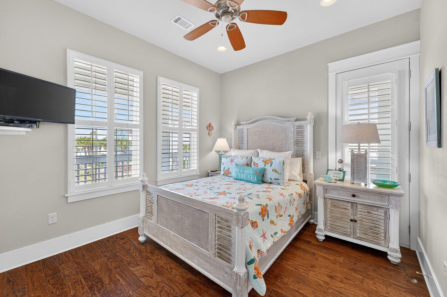 4480 Ocean View Drive Destin, FL 32541 - Photo 16 of 34 a bedroom with a bed and a window