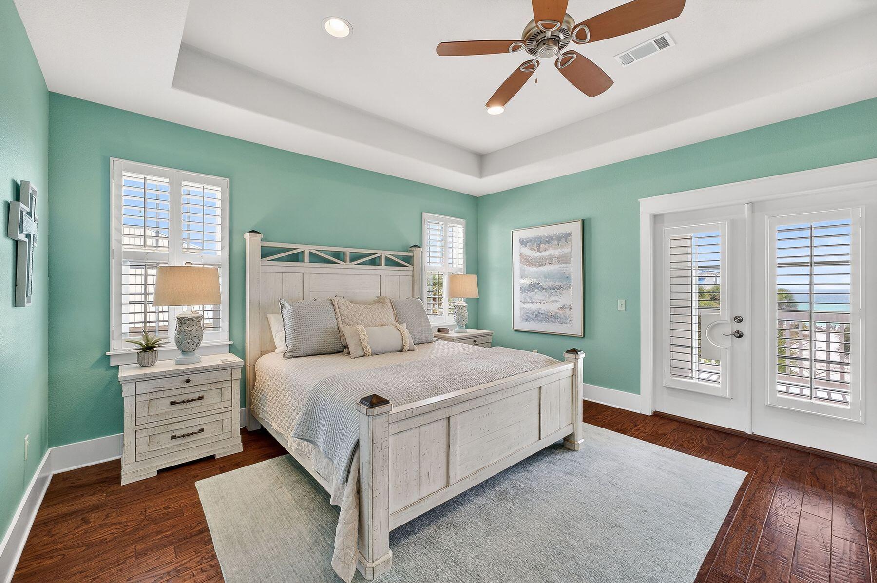 4480 Ocean View Drive Destin, FL 32541 - Photo 18 of 34 a bedroom with a large bed and a window