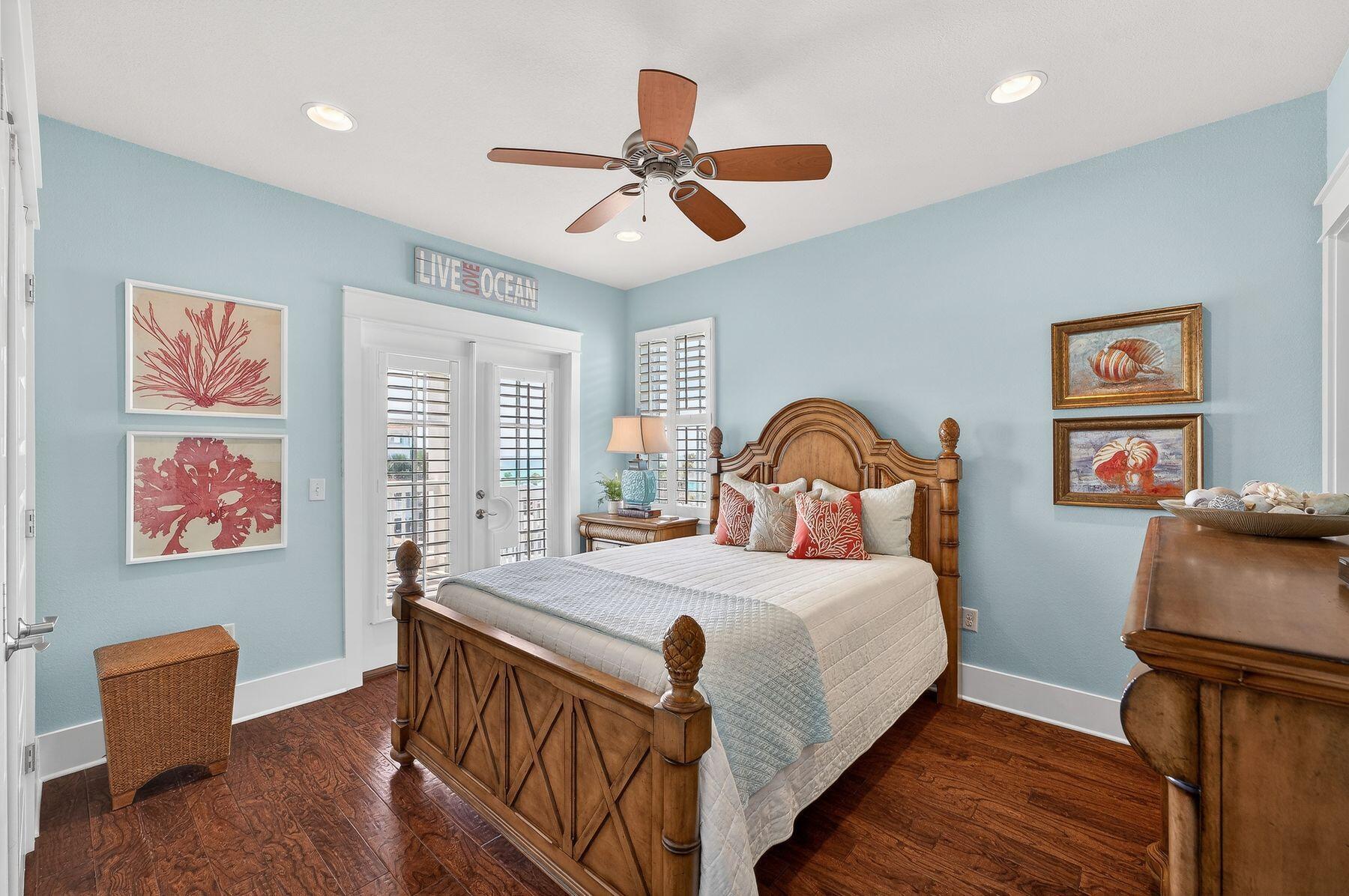 4480 Ocean View Drive Destin, FL 32541 - Photo 22 of 34 a bedroom with a bed and a painting on the wall