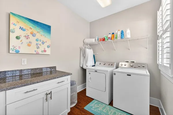 a bathroom with a shower and a sink