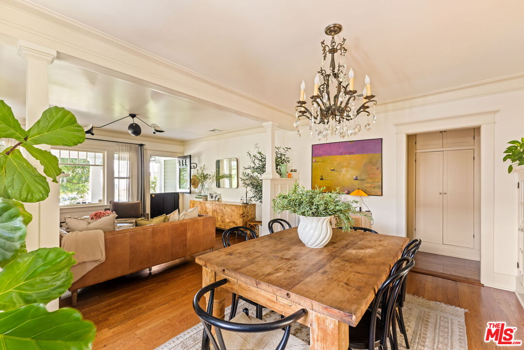 5152 Vincent Avenue Los Angeles, CA 90041 - Photo 12 of 36 a view of a dining room with furniture window and wooden floor