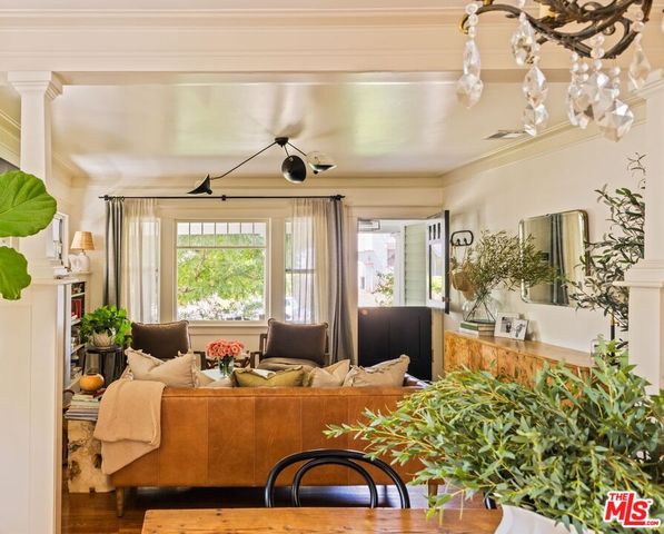 a outdoor living space with patio furniture and potted plants