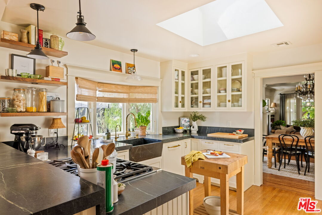 5152 Vincent Avenue Los Angeles, CA 90041 - Photo 15 of 36 a view of a living room and dining room