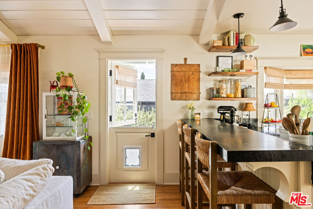 5152 Vincent Avenue Los Angeles, CA 90041 - Photo 17 of 36 a dining room with furniture and window