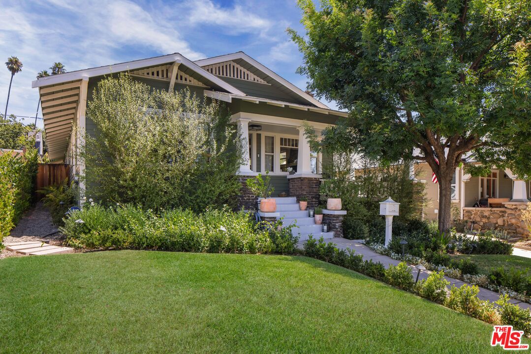 5152 Vincent Avenue Los Angeles, CA 90041 - Photo 2 of 36 a front view of house with a garden