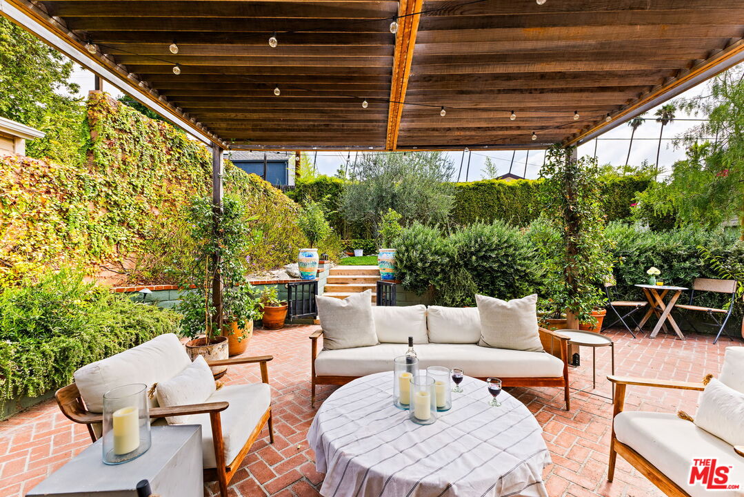 5152 Vincent Avenue Los Angeles, CA 90041 - Photo 23 of 36 a outdoor space with patio lots of furniture