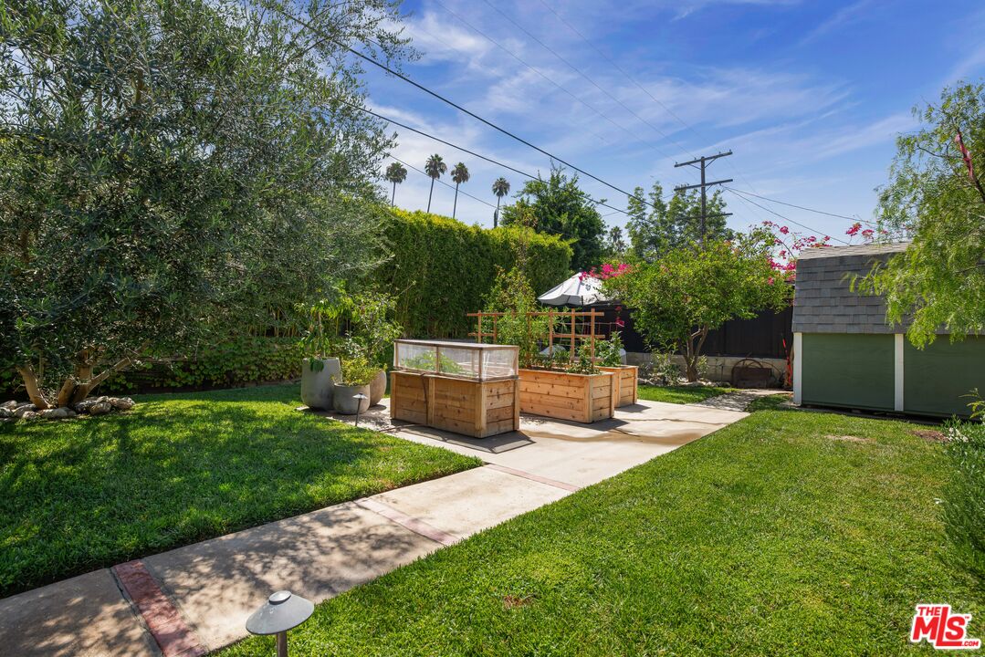 5152 Vincent Avenue Los Angeles, CA 90041 - Photo 24 of 36 a view of a chair and table in the garden