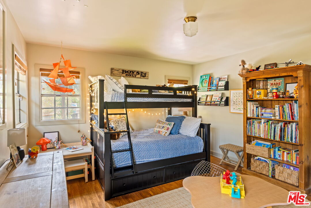 5152 Vincent Avenue Los Angeles, CA 90041 - Photo 31 of 36 a living room with furniture and a book shelf