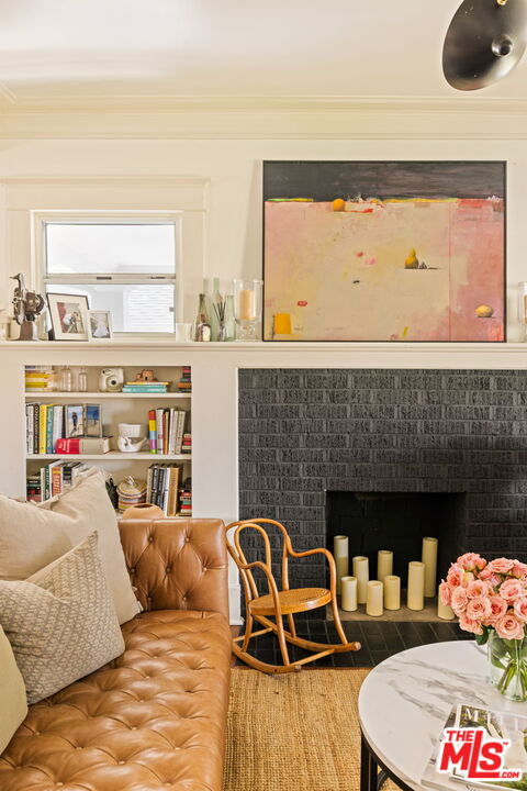 5152 Vincent Avenue Los Angeles, CA 90041 - Photo 7 of 36 a living room with furniture and a fireplace