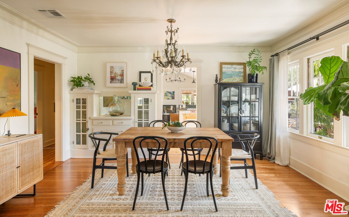 5152 Vincent Avenue Los Angeles, CA 90041 - Photo 10 of 36 a view of a dining room with furniture window and wooden floor