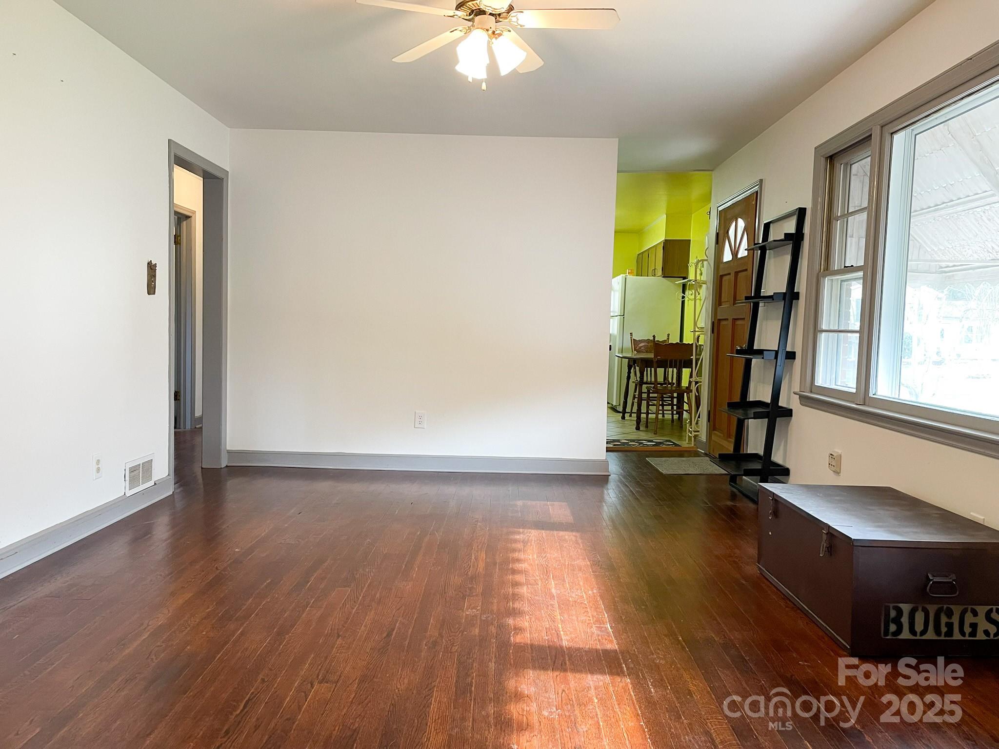 3799 Highway 18 Morganton, NC 28655 - Photo 12 of 33 a view of empty room with wooden floor and fan