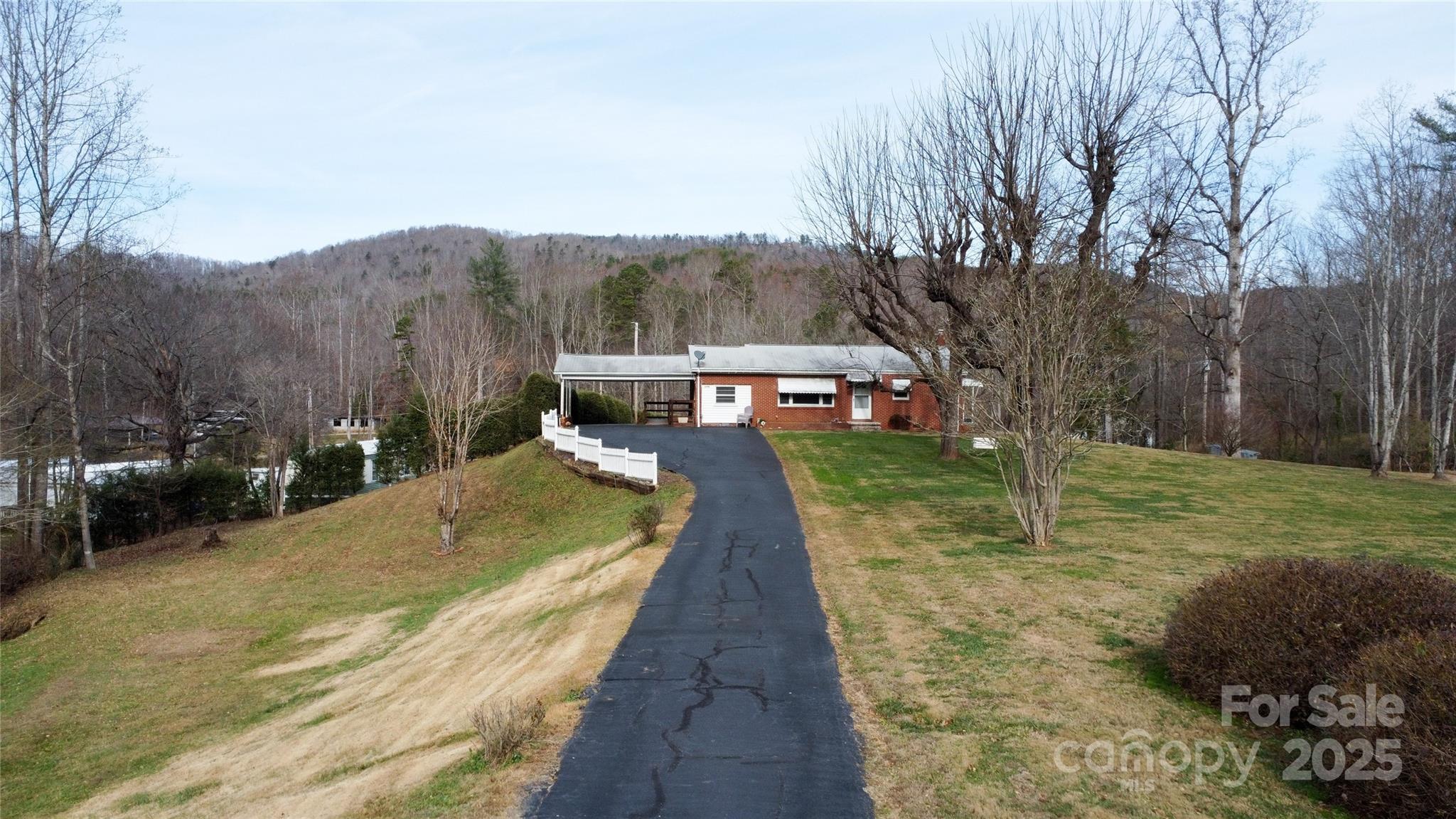 3799 Highway 18 Morganton, NC 28655 - Photo 2 of 33 a view of swimming pool with a yard and large trees