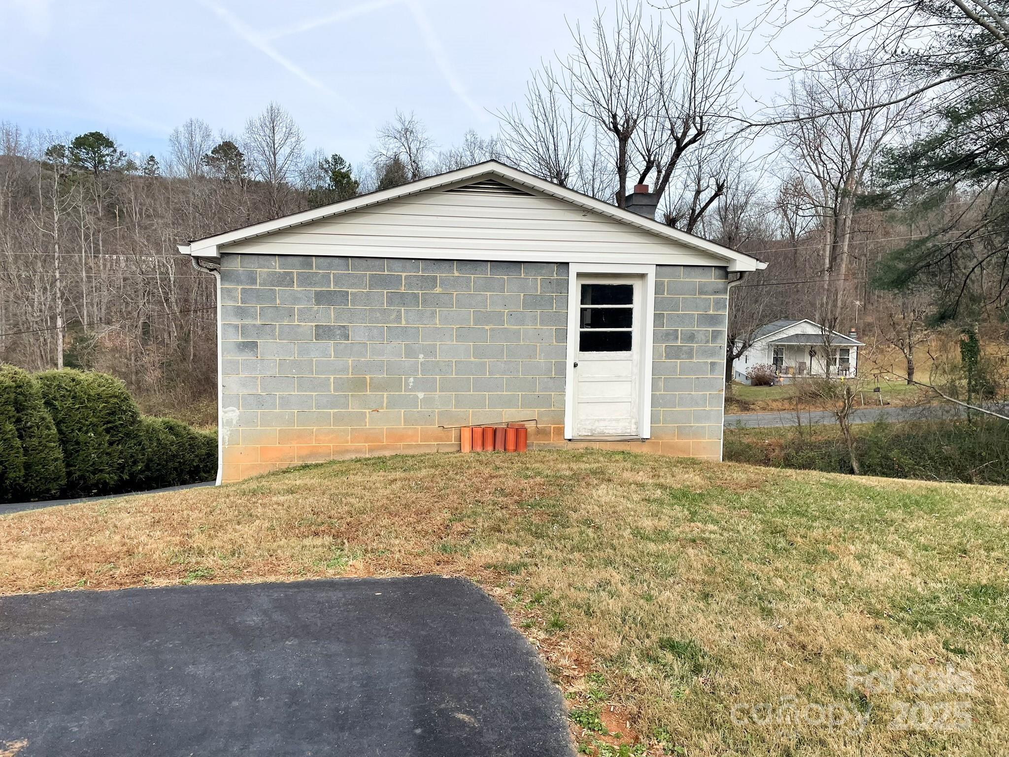3799 Highway 18 Morganton, NC 28655 - Photo 25 of 33 a view of a house with a yard
