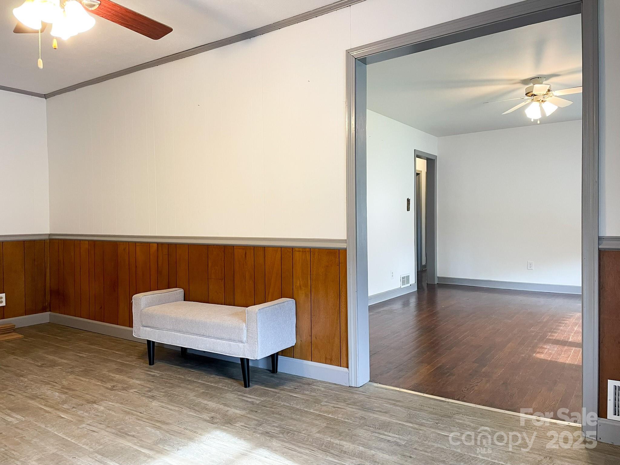 3799 Highway 18 Morganton, NC 28655 - Photo 10 of 33 a living room with a couch and a potted plant on a dresser