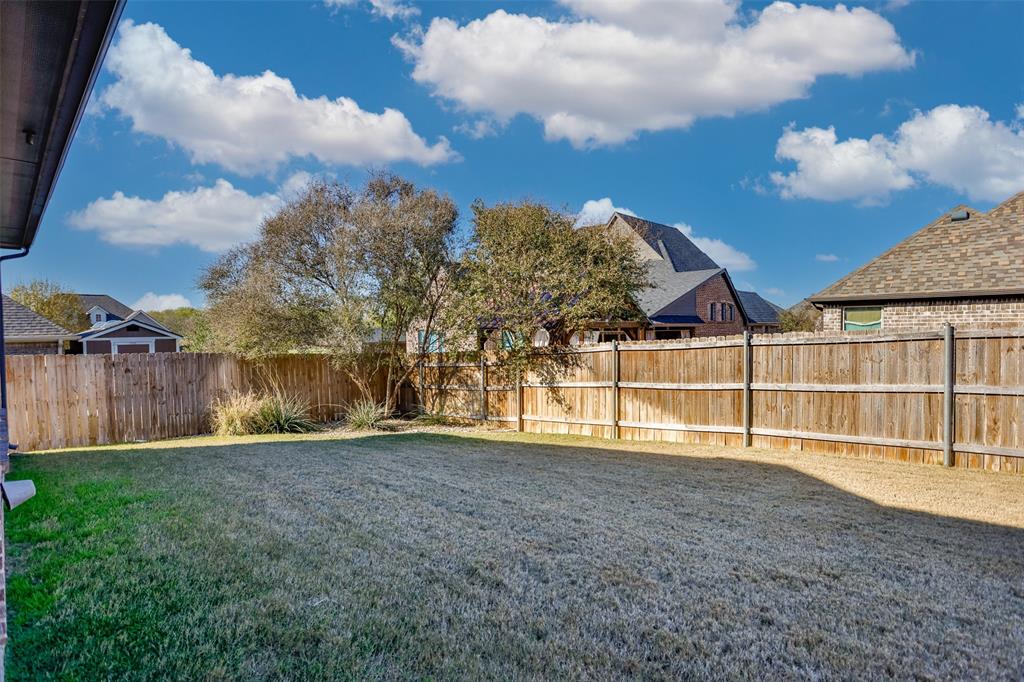 702 La Paloma Road Sanger, TX 76266 - Photo 37 of 40 a view of an outdoor space and yard