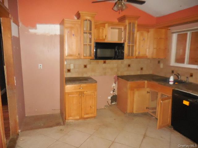 2 Hollow Street Bellport, NY 11713 - Photo 16 of 29 a bathroom with a sink a vanity and a mirror