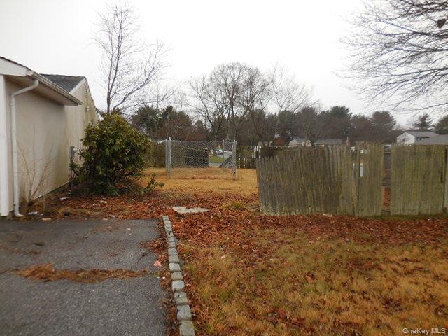 2 Hollow Street Bellport, NY 11713 - Photo 3 of 29 a view of a backyard