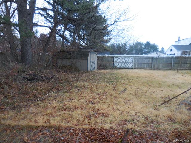 2 Hollow Street Bellport, NY 11713 - Photo 6 of 29 a view of backyard with large trees