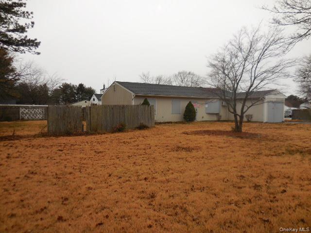 2 Hollow Street Bellport, NY 11713 - Photo 7 of 29 a view of a backyard of the house
