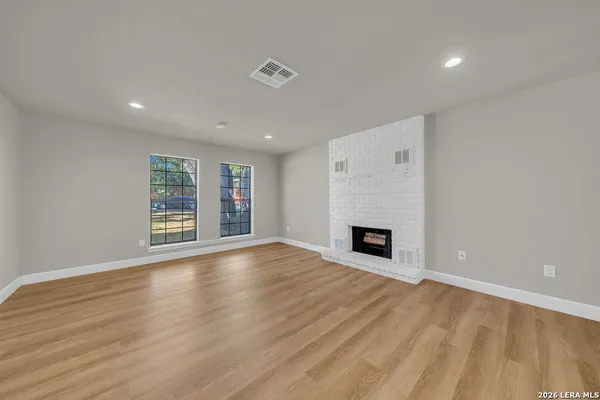 a view of a livingroom with a fireplace