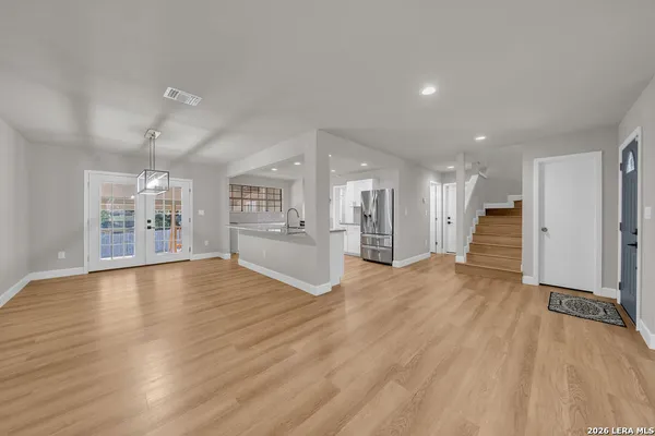 a view of a kitchen with a sink and a kitchen