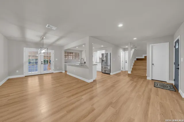 a view of a kitchen with a sink and a kitchen
