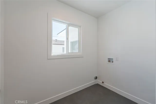 an aerial view of multiple houses with yard