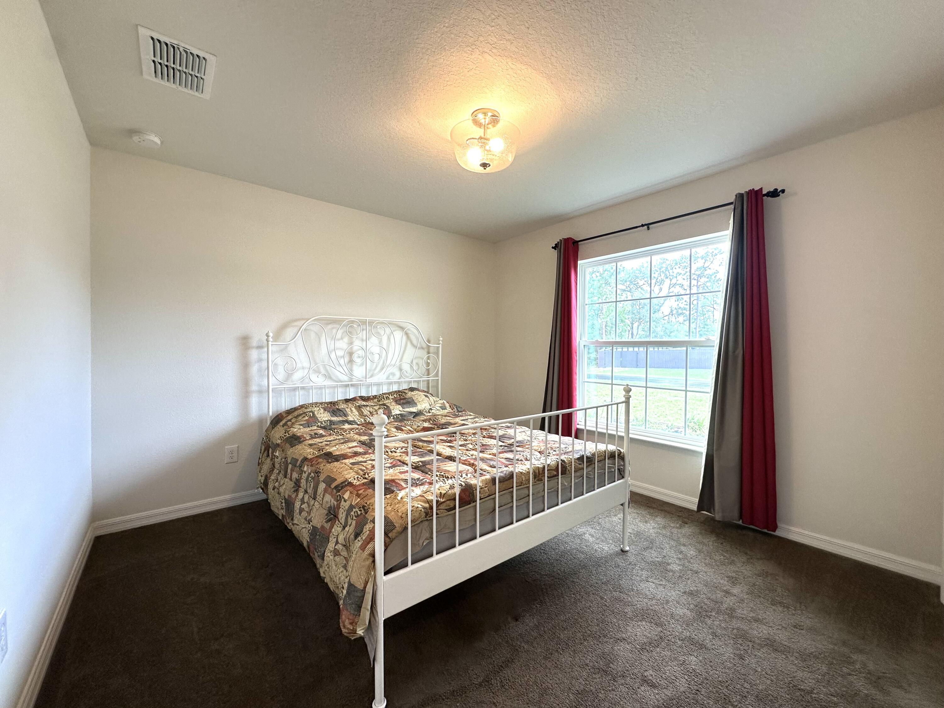 15211 Southwest 65th Ter Road Ocala, FL 34473 - Photo 16 of 22 #2 Bedroom