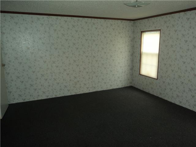 2255 Frazier Road Beechgrove, TN 37018 - Photo 9 of 12 The master bedroom, featuring a large walk-in closet