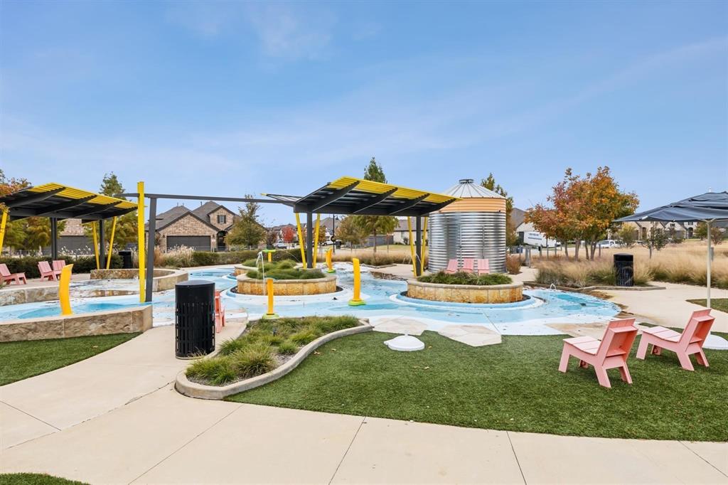 4933 Switchback Street Little Elm, TX 76227 - Photo 28 of 33 Splash pad area.