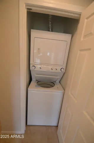 a view of an buildings from the balcony