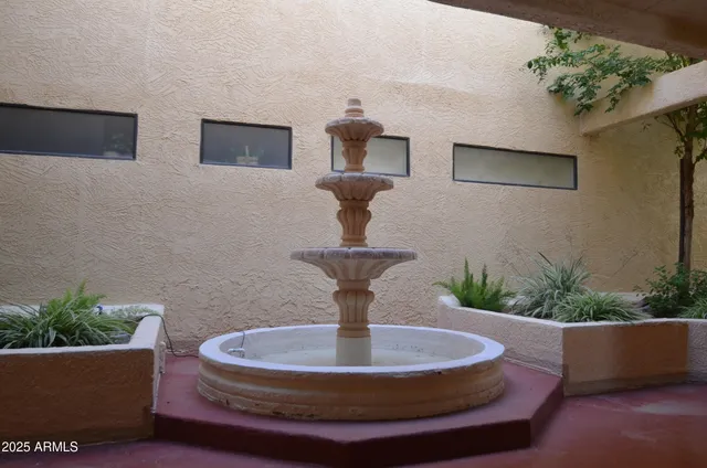 a vase of flowers sitting on a table