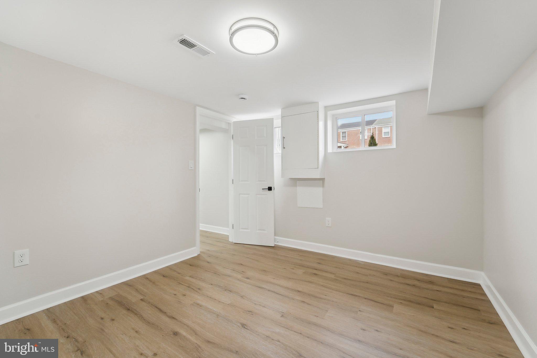 2920 Cornwall Road Dundalk, MD 21222 - Photo 12 of 38 wooden floor in an empty room