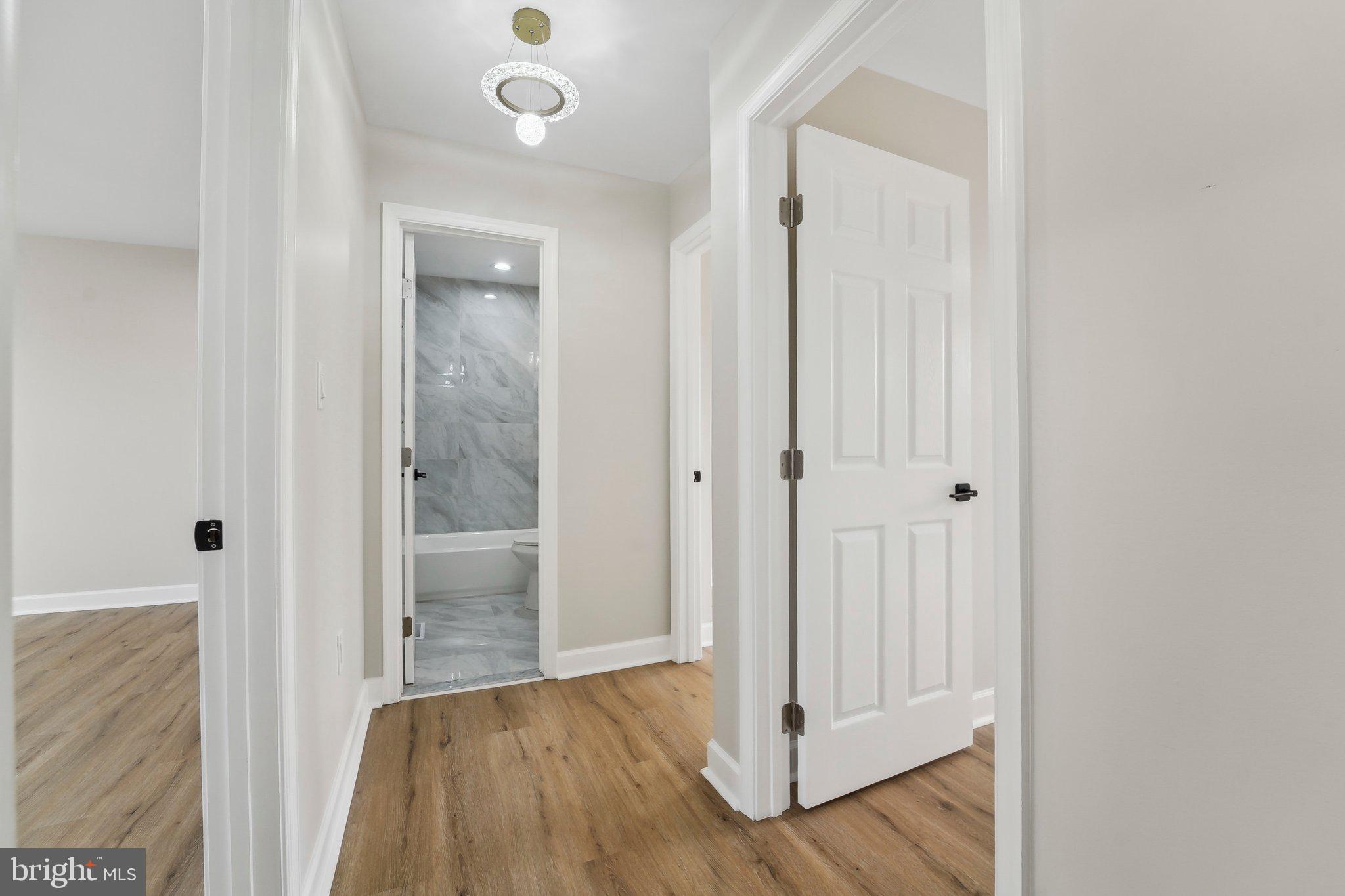 2920 Cornwall Road Dundalk, MD 21222 - Photo 20 of 38 a view of a hallway with wooden floor