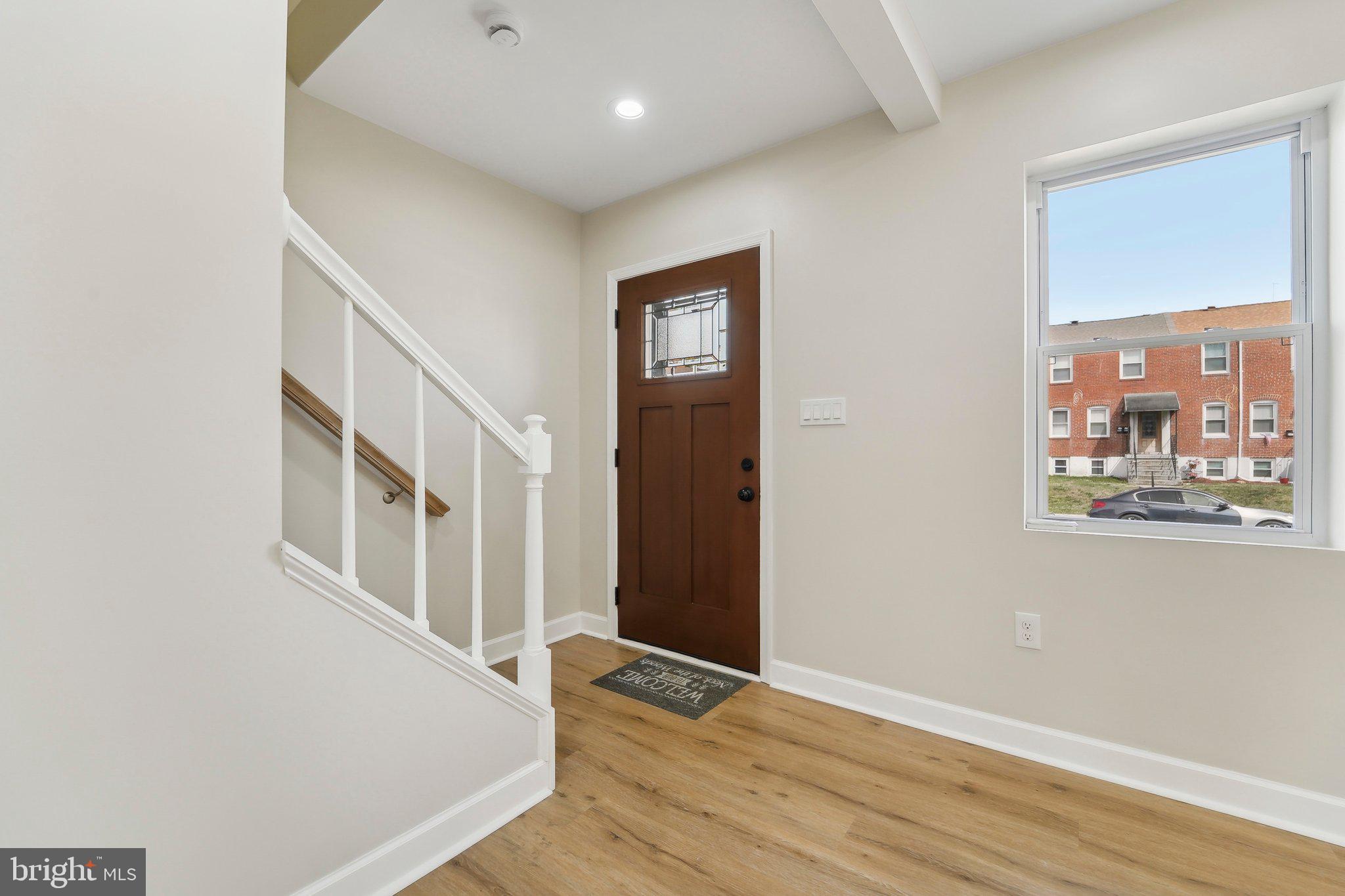 2920 Cornwall Road Dundalk, MD 21222 - Photo 25 of 38 a view of an entryway with wooden floor