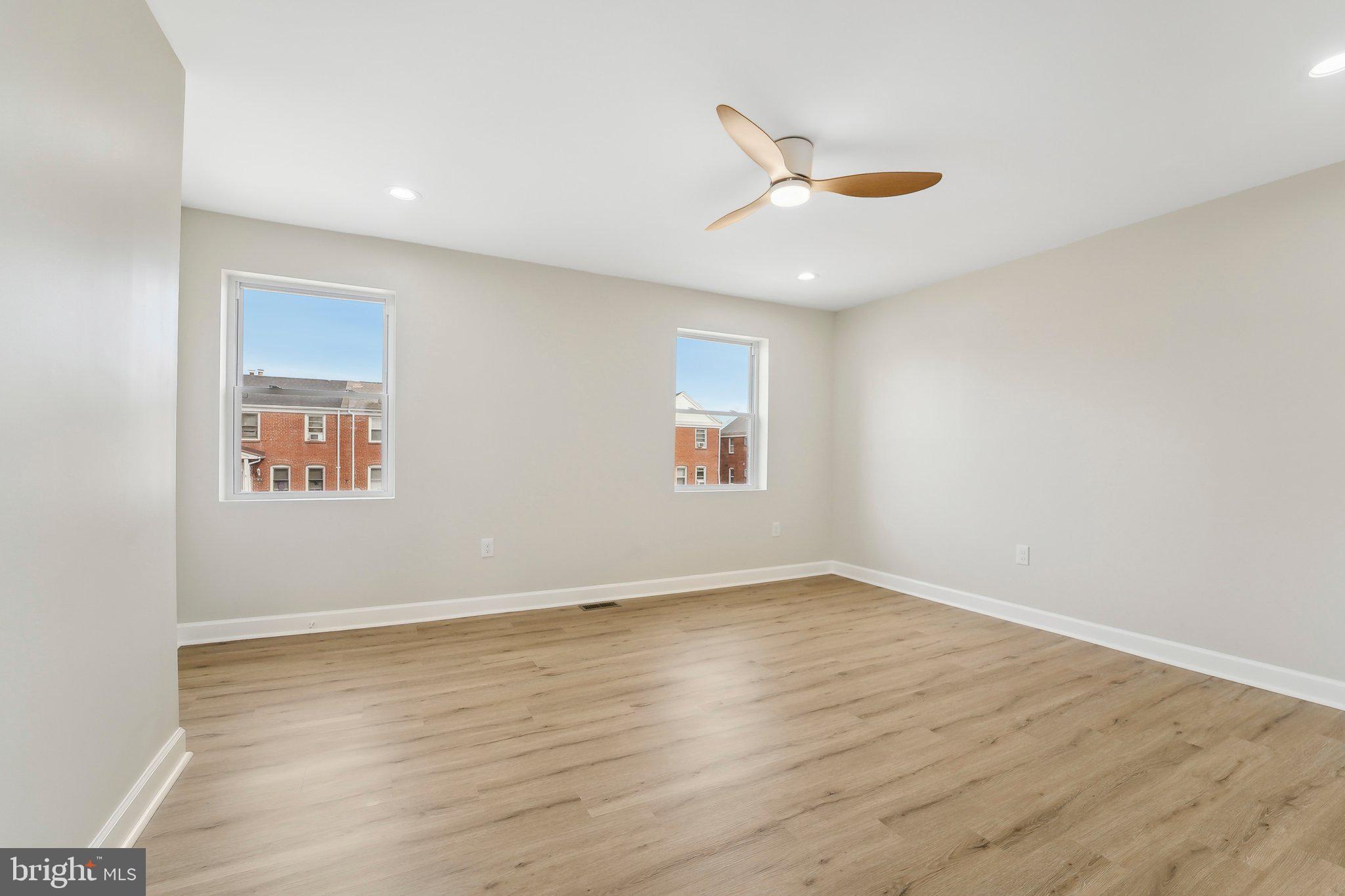 2920 Cornwall Road Dundalk, MD 21222 - Photo 29 of 38 wooden floor in an empty room with a window
