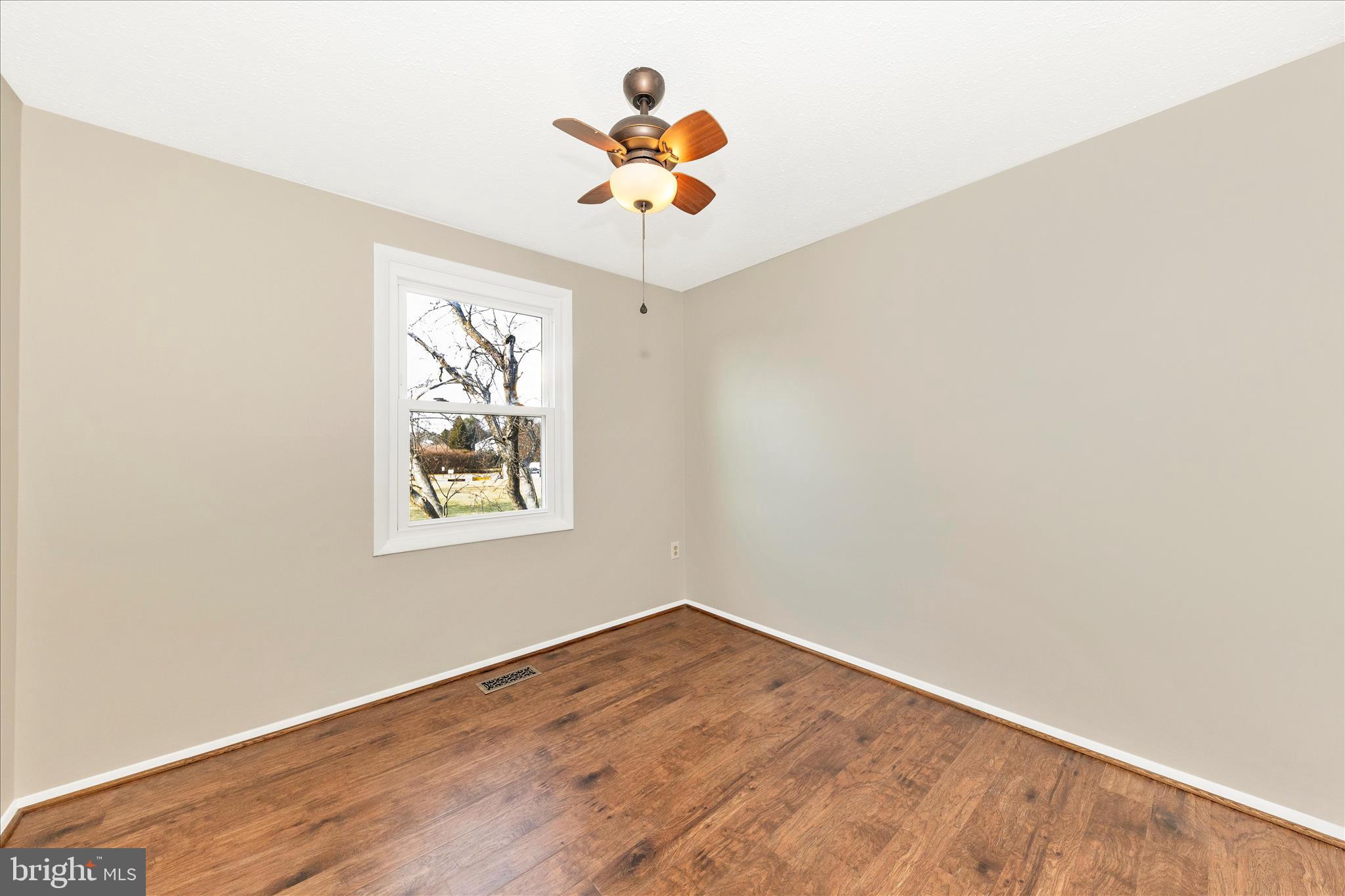 6616 Pebble Court Frederick, MD 21703 - Photo 19 of 33 an empty room with a window